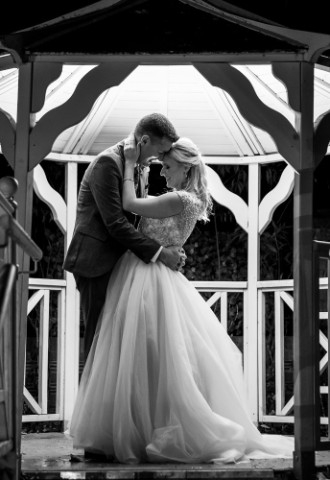 Wedding couple in pavilion at The Elephant Hotel