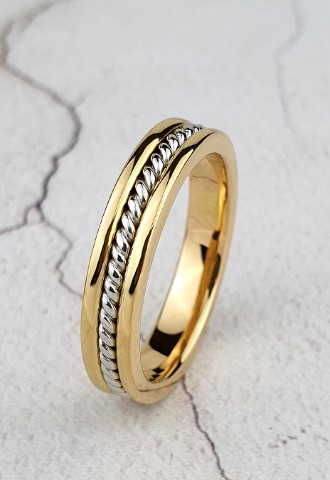 bespoke wedding ring in 22ct gold with a twisted platinum centre