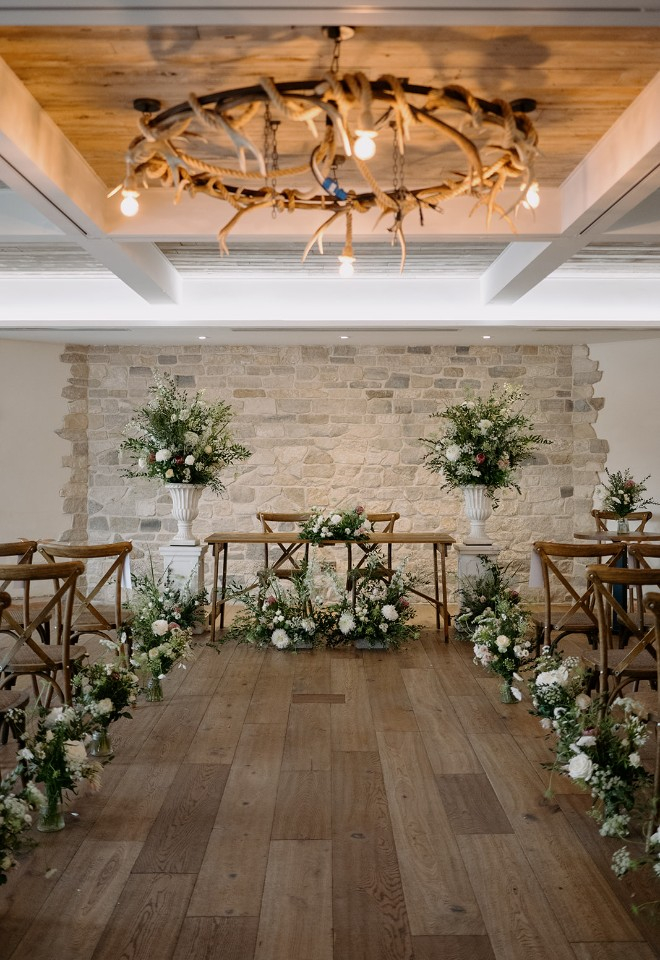 Wedding ceremony at in the Wild Thyme & Honey suite