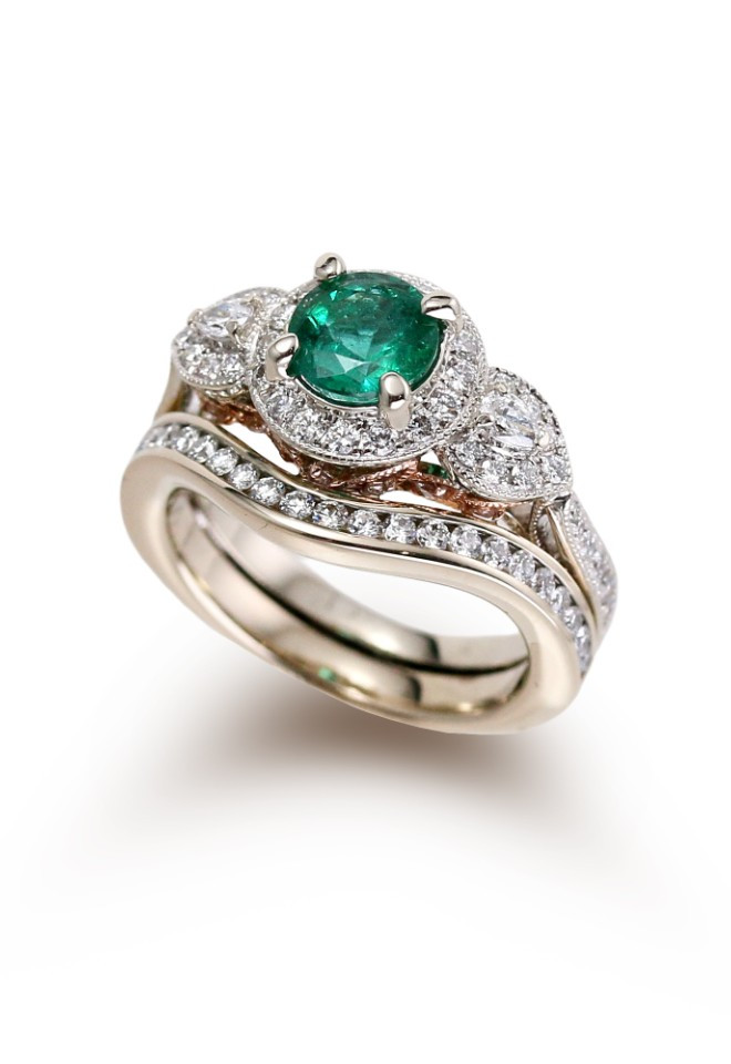 Shaped diamond bespoke wedding ring to fit around vintage emerald enagegement ring