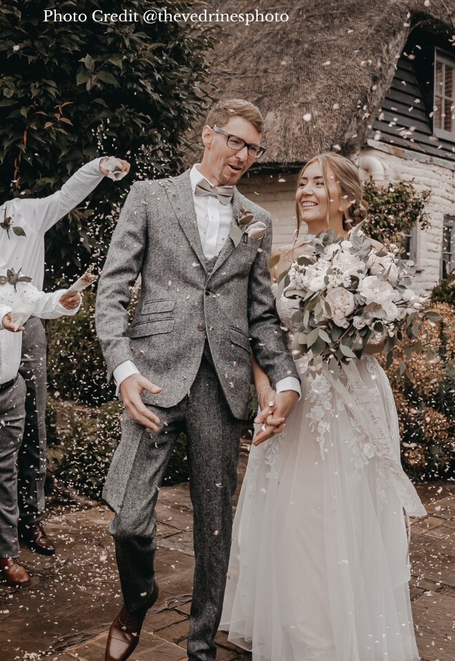 Real wedding confetti moment with petals from The Dried Petal Company