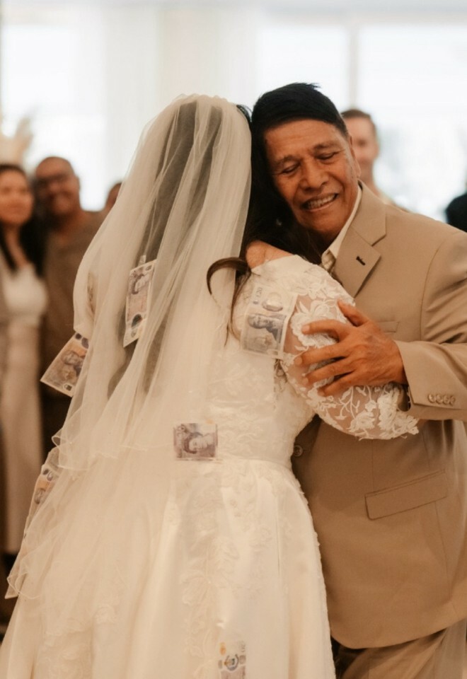 father of the bride hugging his daughter at her wedding at The Nici Hotel, Bournemouth