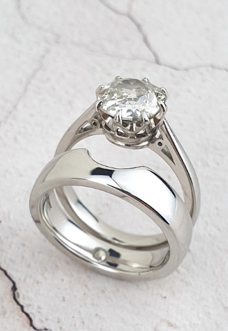 custom platinum wedding ring cut to fit the engagement ring