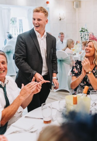 Guests applaud ben Smiths magic during wedding breakfast