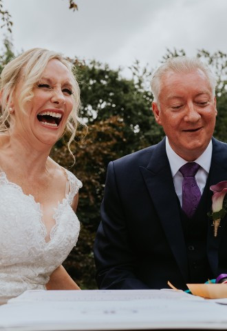Celebrant Lisa with bride and groom at Boconnion