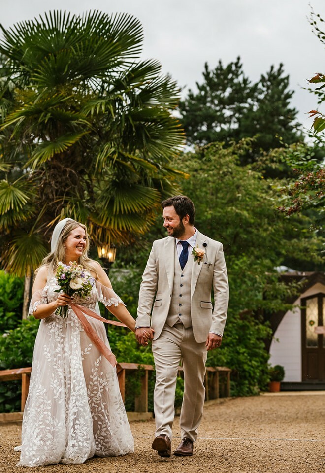 Bride & Groom walking to woodland