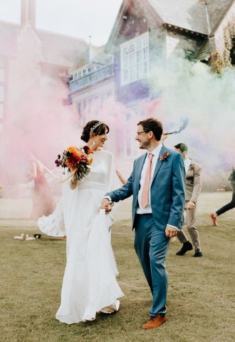 Bride and groom posing for wedding photography at Plas Dinam, Mid Wales