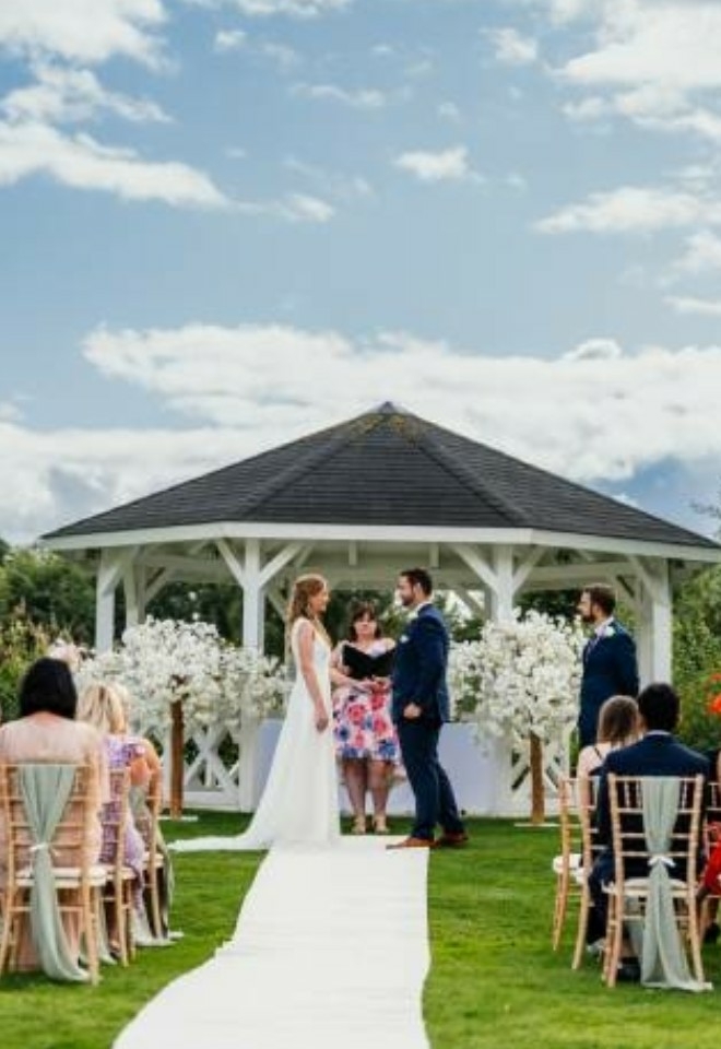 Blue skies and clouds above the pagoda for ceremony outside- Sprowston Manor Norwich