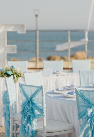 Teal themed wedding breakfast set up on a yacht in cyprus