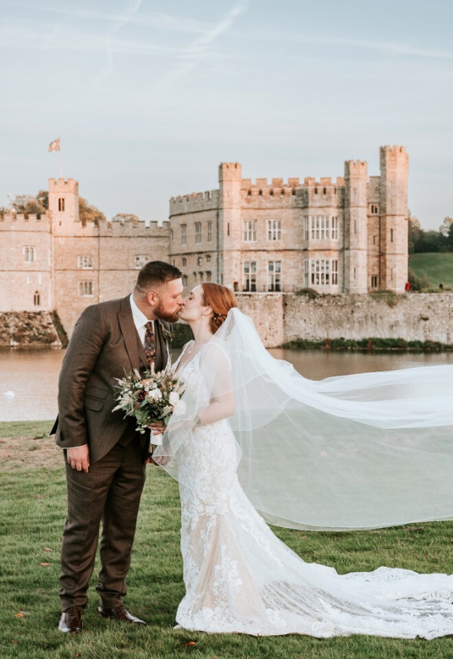 Bride and groom outside of Leeds Castle