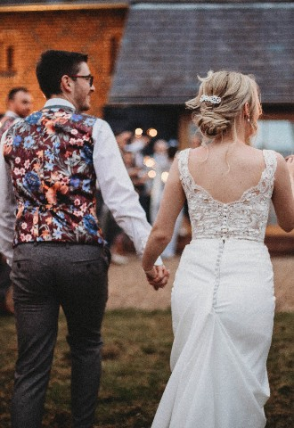 Wedding couple photo outdoors with sparklers at Copdock Hall