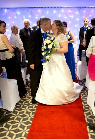 Bride and Groom Kissing at Holiday Inn Basildon Wedding Venue