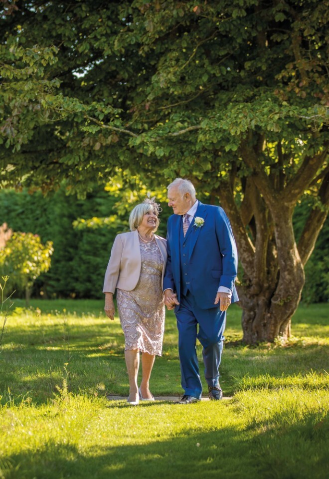 Wedding guests at the picturesque Battel Hall at Leeds Castle in Kent