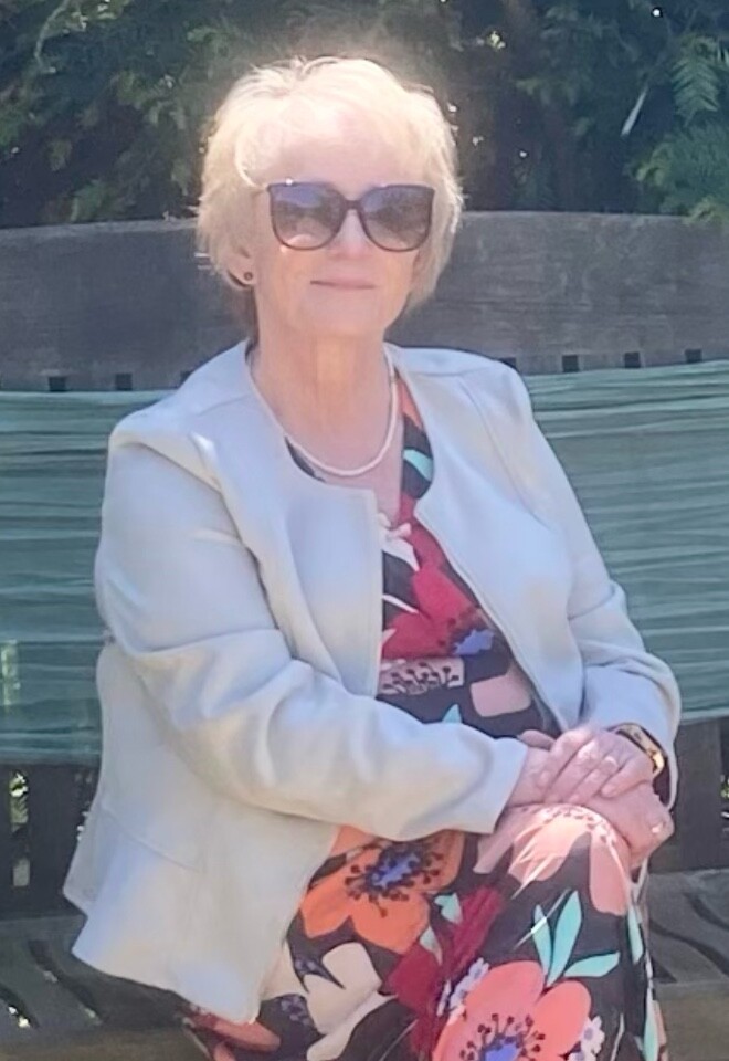 Liz sitting in the sun ready for the ceremony
