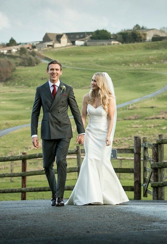 bride and groom with stunning view behind them