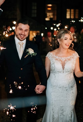 Bride and groom sparkler exit at Howsham Hall, North Yorkshire