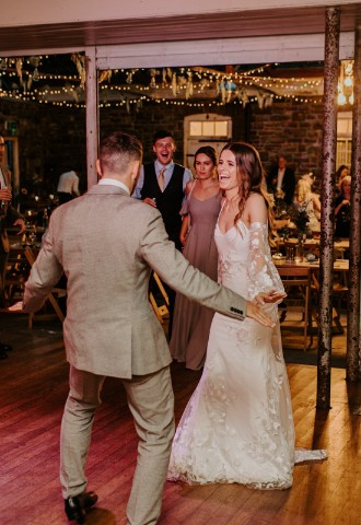 Bride and groom share their first dance at Plas Dinam, Powys