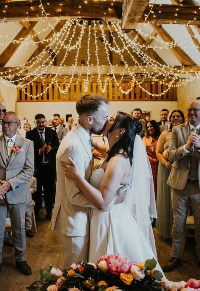 Indoor ceremony with guests 