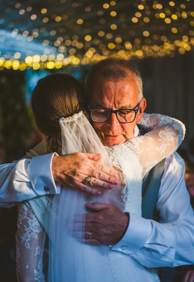 Documentary wedding photography capturing emotional family moments naturally