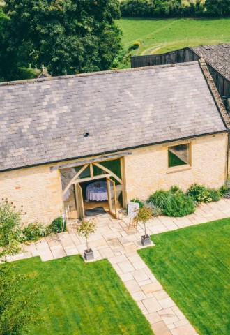 Drone shot of the wedding barn at Upcote