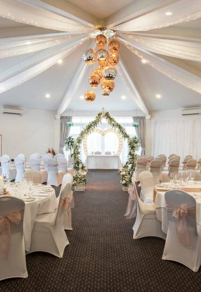 white and pink wedding reception