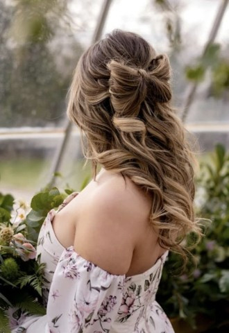 Romantic bow detail curly half up half down style 