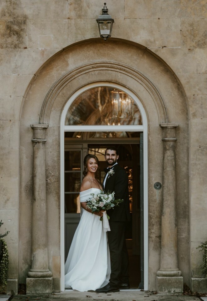 Bride and Groom in Cuckney House Doorway