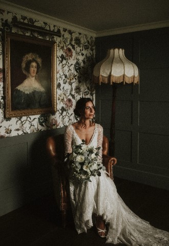 Bride in the Ante Room at Auchen Castle - romantic castle wedding venue in Scotland
