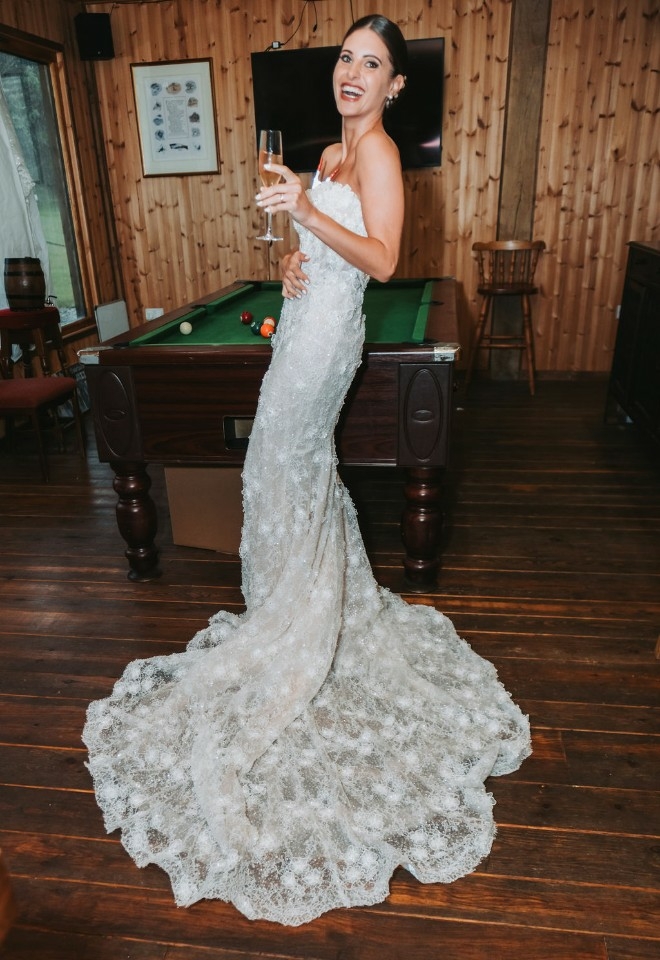 Fun shot of bride enjoying a glass of fizz at the Chilterns View Wedding Venue Oxfordshire