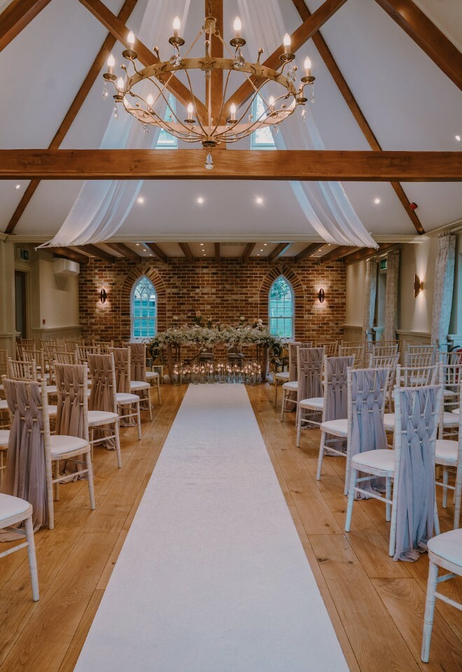 Copper suite ceremony room at Mulberry House, Essex dressed by TJ Designer Weddings