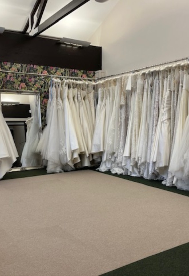 Racks of dresses at Broomvale Bridal Barns