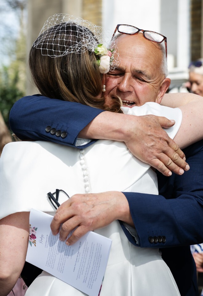 London wedding hugs