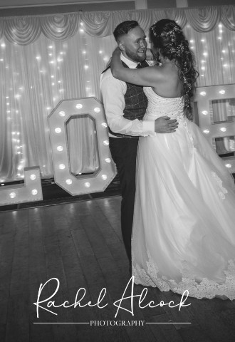Grand hotel wedding reception, bride and groom first dance