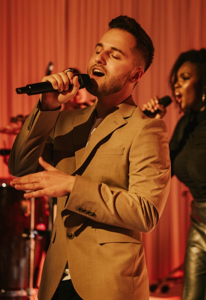 Male wedding singer performing 