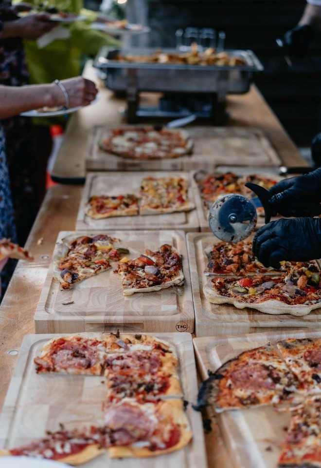 Pizza being served