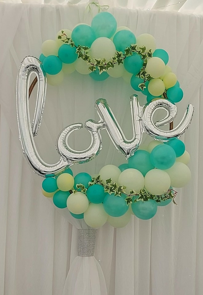 love balloon theme mint green with silver love in the centre from inflate to create