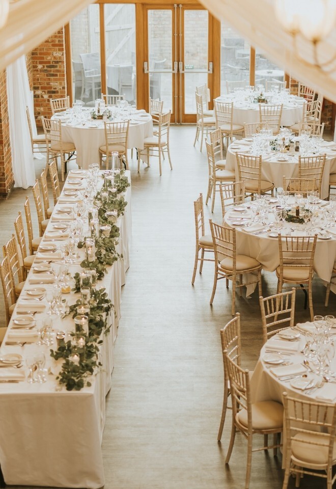 Wedding breakfast set up inside Hall Farm