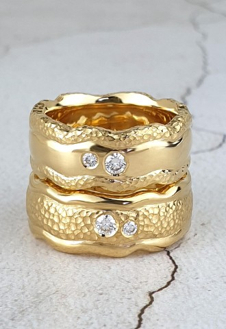 Unique handmade 22ct gold wedding rings with diamonds