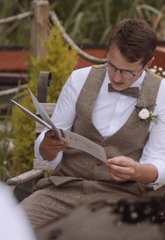 groom reading letter