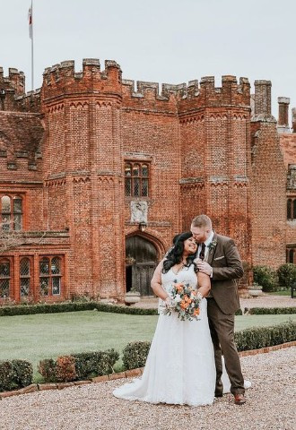 Bride and groom outside Leez Priory, Essex