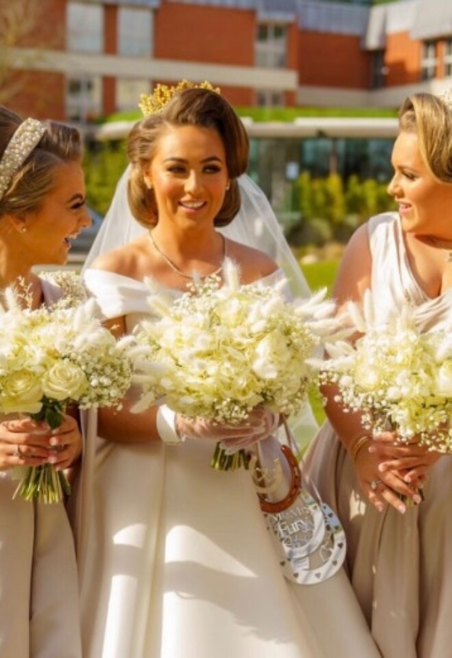 Bride and her maids; beautiful white & cream bouquets. 