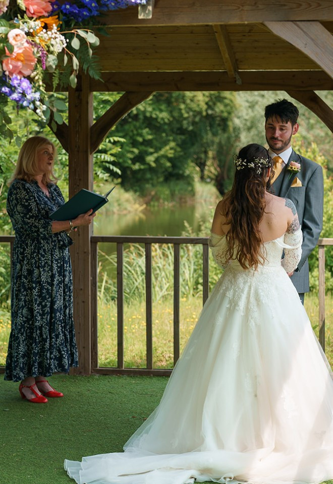 Bride and groom in gazebo 