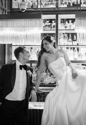 Bride and Groom sat at The Biltmore Bar