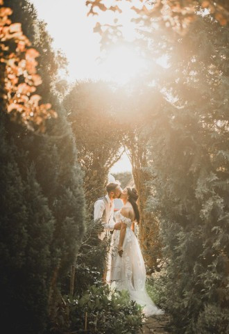Couple in the trees at Skitby House wedding venue in Cumbria