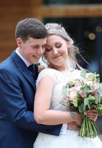 Couple at Mill Barns Alverley wedding poses, by SMD Wedding Photography