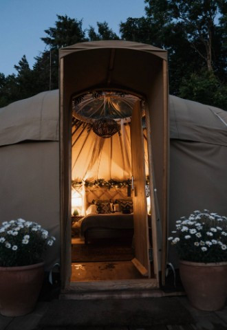 Luxury accomodation tree-yurt at night, Eavestone Lake