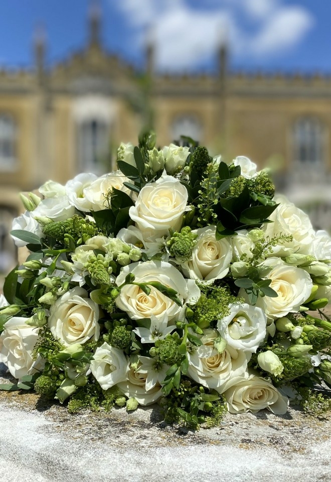 White flower bouquet by hire heaven