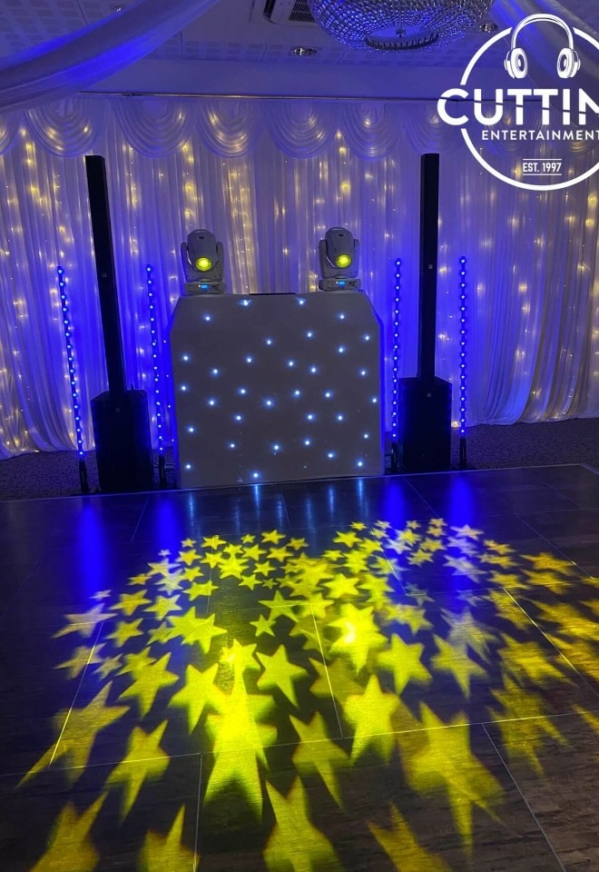 STARLIT WHITE DJ STAND AND DISCO LIGHTING