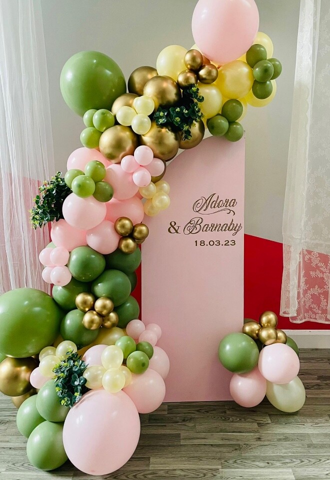 Welcome balloon arch and backdrop. 