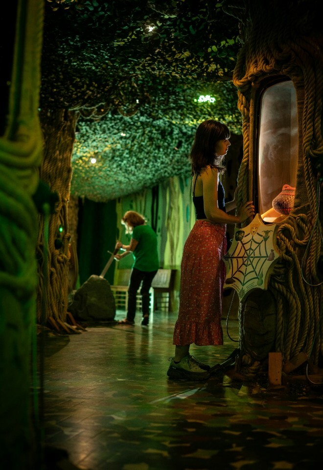 Two Guests Admiring The Whispering Woods